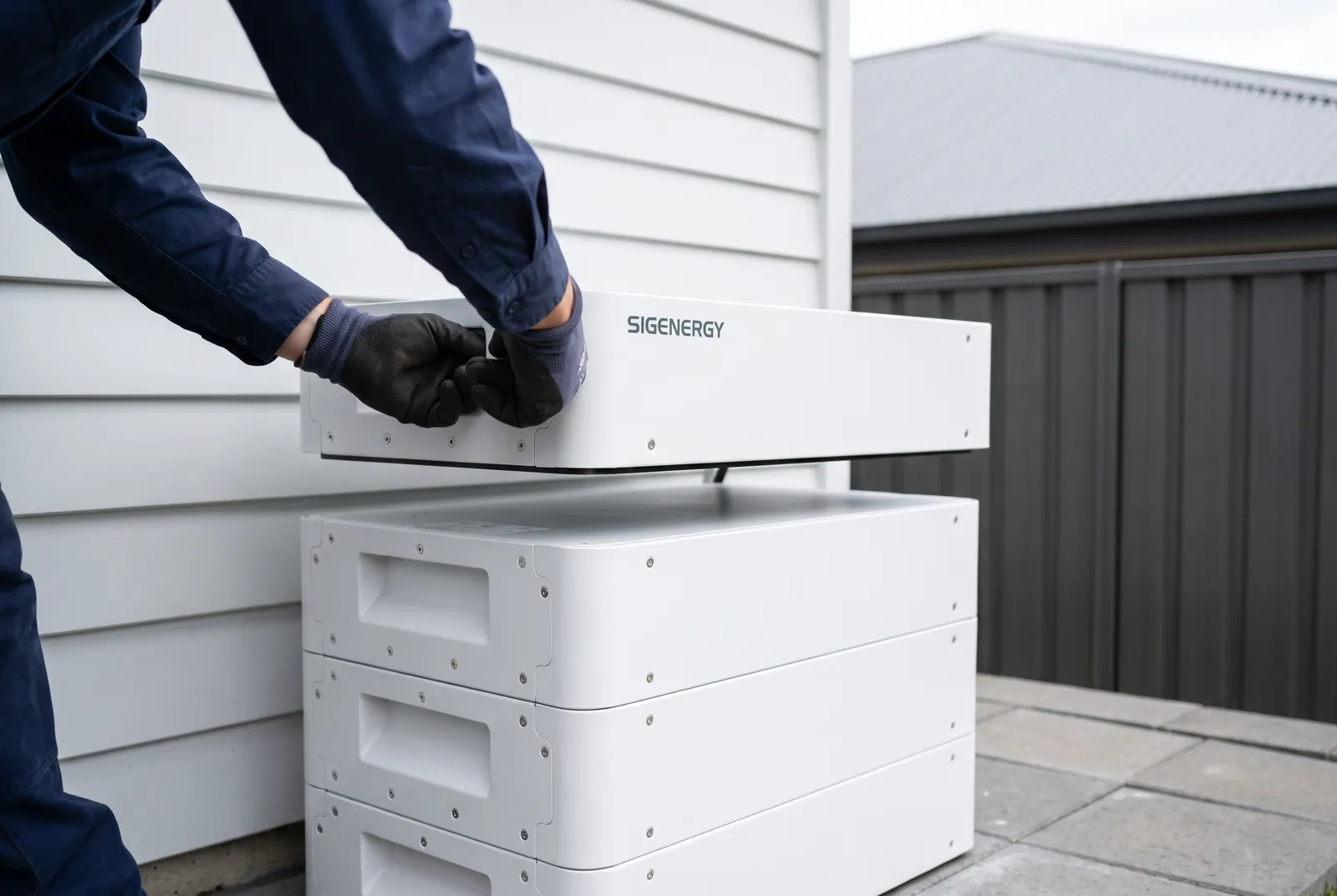 A Sigenergy battery being stacked