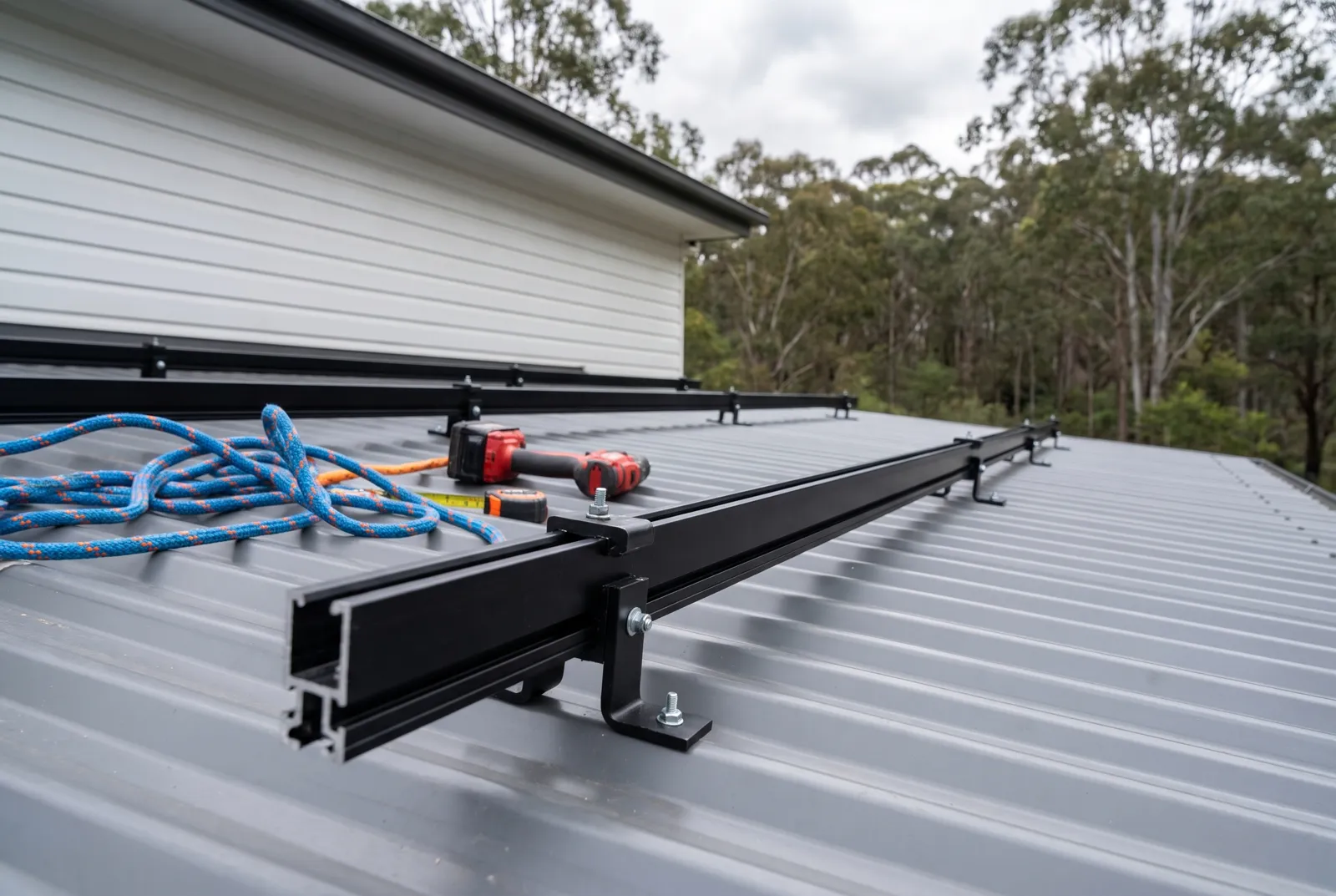 Mounting rails fixed to a metal roof